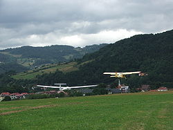 Airplane Picture - Polish civilian Yak-12M taking off towing a glider