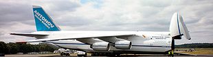 Airplane Picture - An-124-100 kneeling with front ramp down (note tilt of aircraft fuselage and retraction of front wheels)