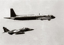 Airplane Picture - A Royal Air Force of Oman Jaguar S(O) intercepting an IL-38 in 1987.