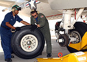 Changing a tire on a P-3C