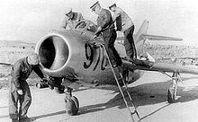 Airplane Picture - Soviet groundcrew prepare a MiG-15bis from Antung airbase,China, mid-1952