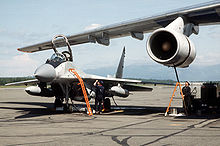 Airplane Picture - MiG-29 with drop tanks receiving fuel transferred from an Il-76 tanker