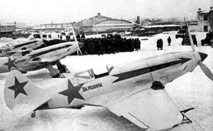 Warbird Picture - Soviet Air Force MiG-3s in winter camouflage. The slogan on the nearest aircraft reads 