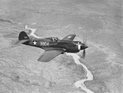 Airplane Pictures - A three-quarter view of a P-40B, X-804 (39-184) in flight. This aircraft served with an advanced training unit at Luke Field, Arizona