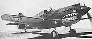 Airplane Pictures - AVG P-40, painted with the shark-face emblem of the Flying Tigers and the 12-point sun roundel of the Chinese Air Force.