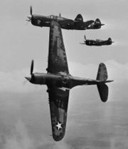 Airplane Pictures - In the vicinity of Moore Field, Texas. The lead ship in a formation of P-40s is peeling off for the attack in a practice flight at the Army Air Forces advanced flying school. Selected aviation cadets were given transition training in these fighters before receiving their pilot's wings, 1943