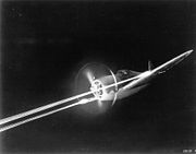 Airplane Pictures - P-47 fires its M2 machine guns during night gunnery