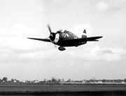 Airplane Pictures - P-47D Kathie with 75-gallon drop tank buzzes the airfield at Bodney, England