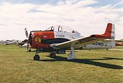 Airplane Pictures - Canadian civil T-28B in US Marine Corps markings in 1988, featuring Bill the Cat cartoon nose art