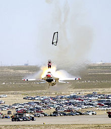 Airplane Picture - Captain Chris Stricklin ejects from his F-16 at an air show in September 2003.