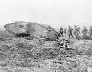 Canadian troops advancing behind a British Mark II tank at the Battle of Vimy Ridge