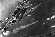 Airplane Pictures - American aircraft attacking a Japanese cruiser at the Battle of Midway.