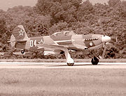 Airplane Pictures - Modern built Yak-9 on takeoff at World War II Air Show, Reading, PA, 2002